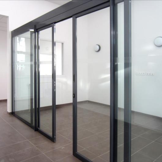 Double glazed partition with double internal glass sliding door